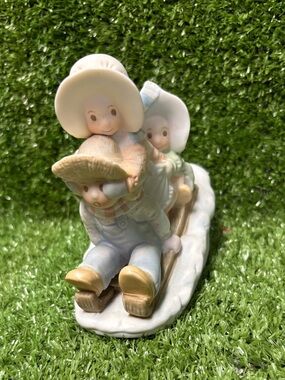 Vintage 1993 figurine "A Sledding We Will Go!" Circle of Friends collection.